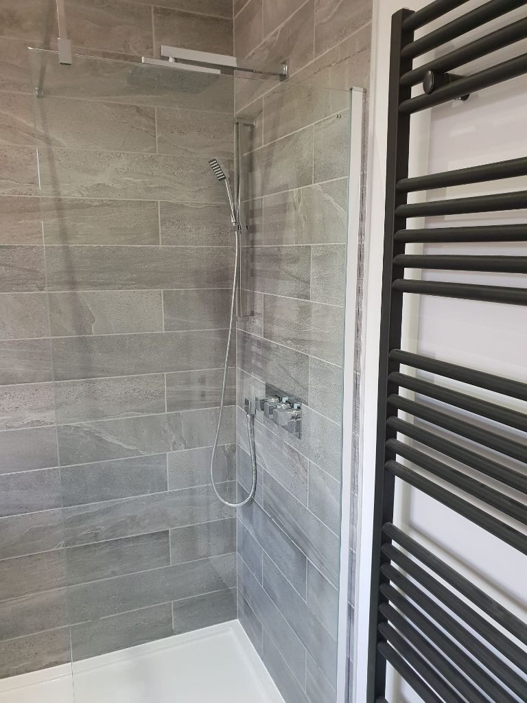 Walk-in shower with rainfall head
